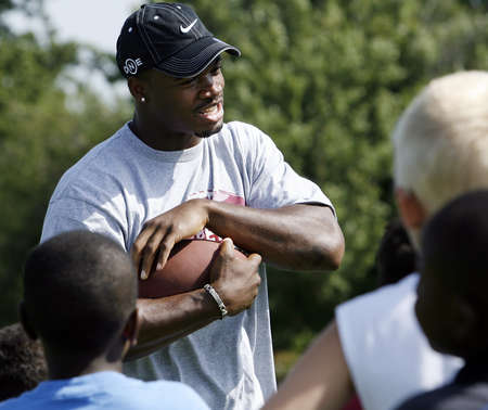adrian peterson football camp for kids